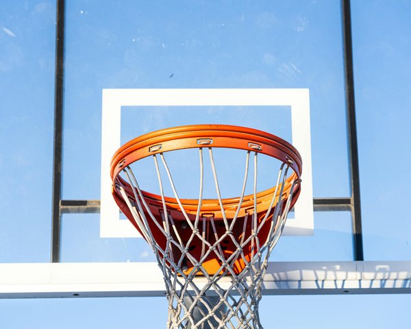 What factors contribute to the home-court advantage in basketball?